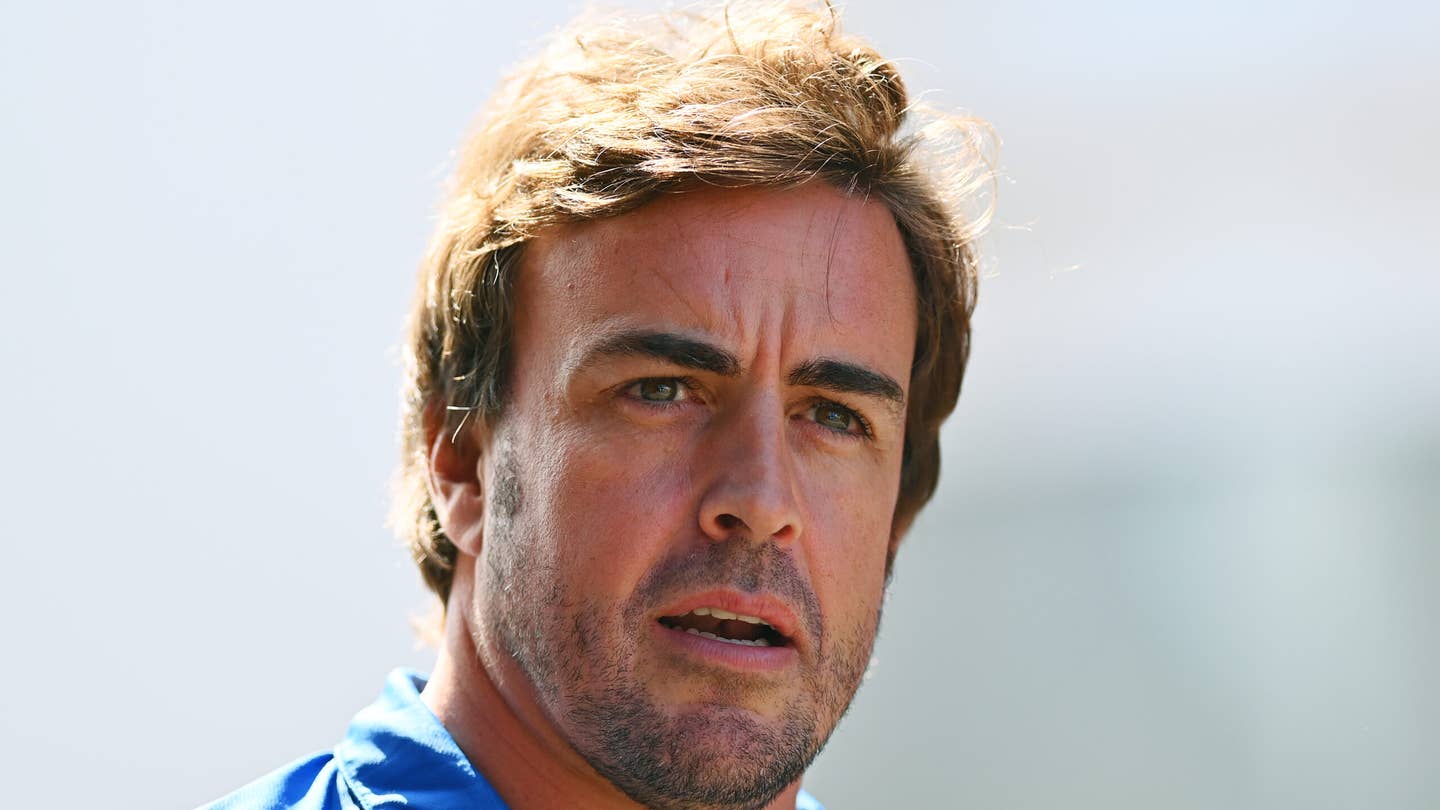 SPA, BELGIUM - AUGUST 25: Fernando Alonso of Spain and Alpine F1 walks in the Paddock during previews ahead of the F1 Grand Prix of Belgium at Circuit de Spa-Francorchamps on August 25, 2022 in Spa, Belgium. (Photo by Dan Mullan/Getty Images)