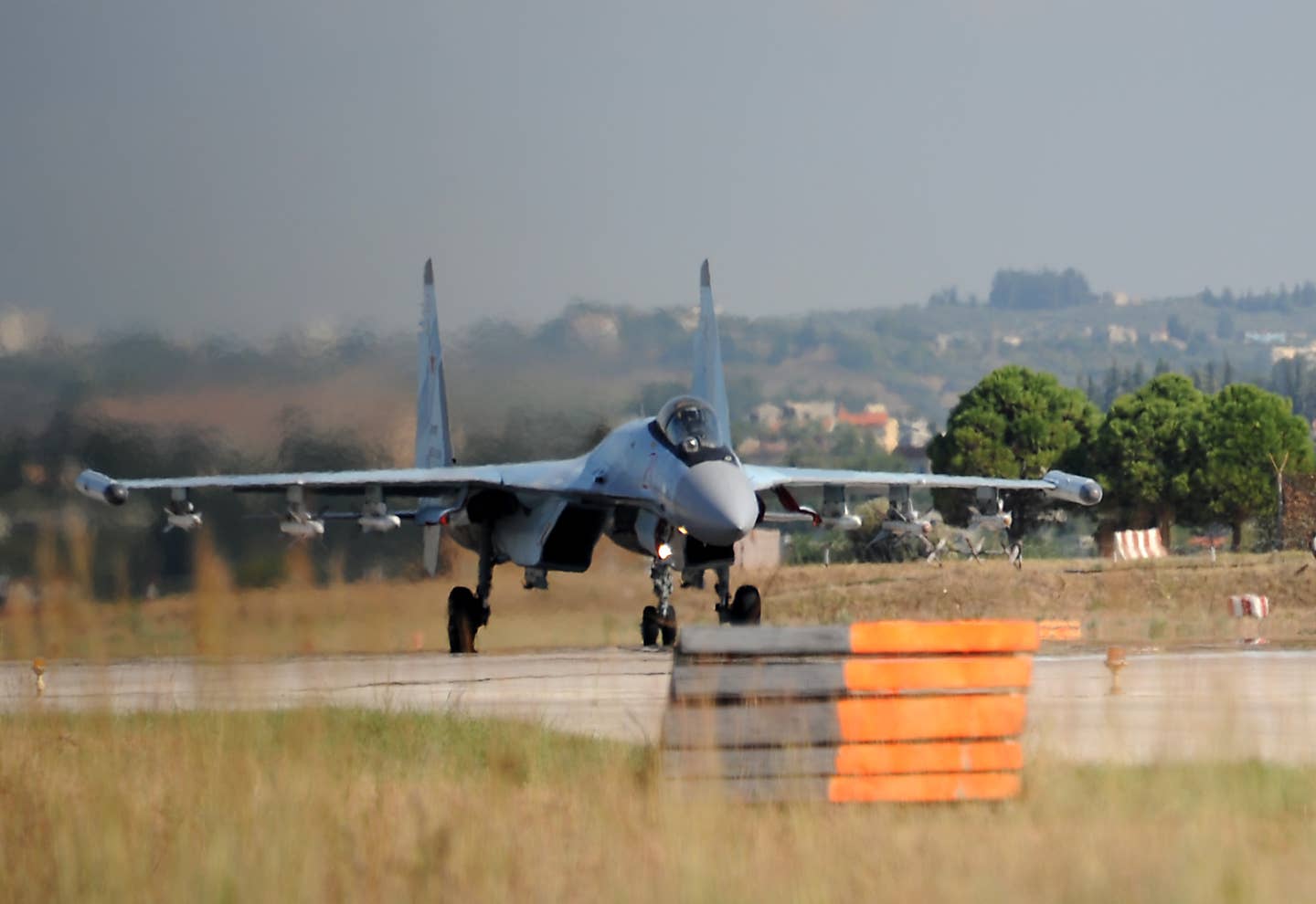 A Russian Aerospace Forces Su-35S prepares to take off from the Russian military airbase of Khmeimim in Syria, in September 2019. <em>Photo by MAXIME POPOV/AFP via Getty Images</em>