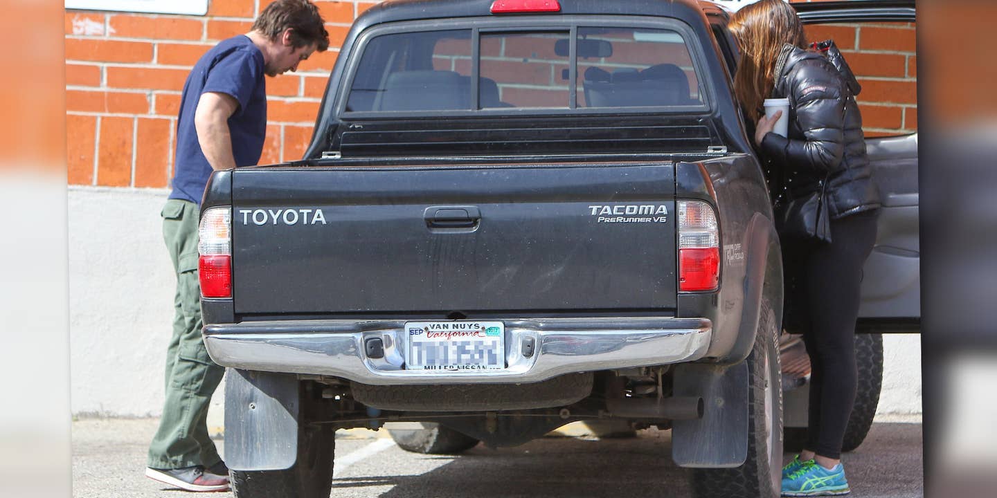 Christian Bale with his used Toyota Tacoma