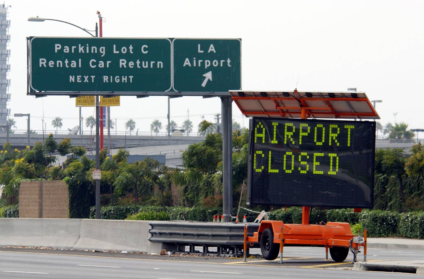 A sign sits outside Los Angeles International Airport (LAX), which is closed because of the air attacks on New York and Washington, DC, on September 11, 2001, in Los Angeles, CA. <em>Credit: Photo by David McNew/Getty Images</em>