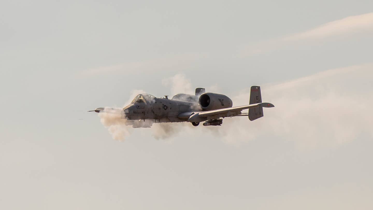 An A-10 Thunderbolt II, from the Idaho National Guard’s 124th Fighter Wing, Boise, Idaho, performs a strafing run during the Hawgsmoke 2022 gunnery competition. <em>Credit: U.S. Air National Guard photo by Senior Master Sgt. Joshua C. Allmaras</em>