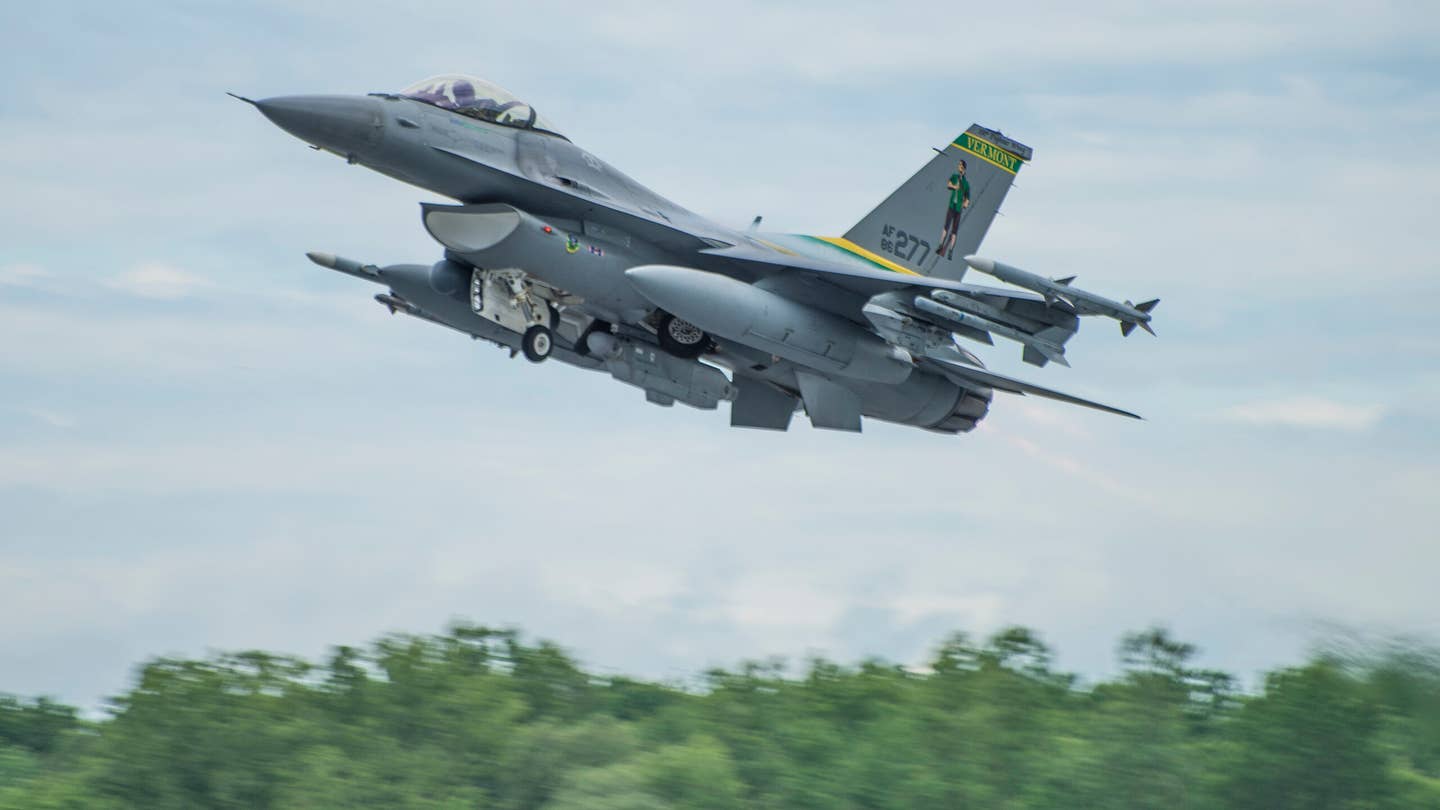 An F-16 Fighting Falcon assigned to the 134th Fighter Squadron, 158th Fighter Wing, Vermont Air National Guard, takes off during exercise Maple Lightning, at the Burlington International Airport. (U.S. Air National Guard photo by Airman 1st Class Jeffrey Tatro/Released)