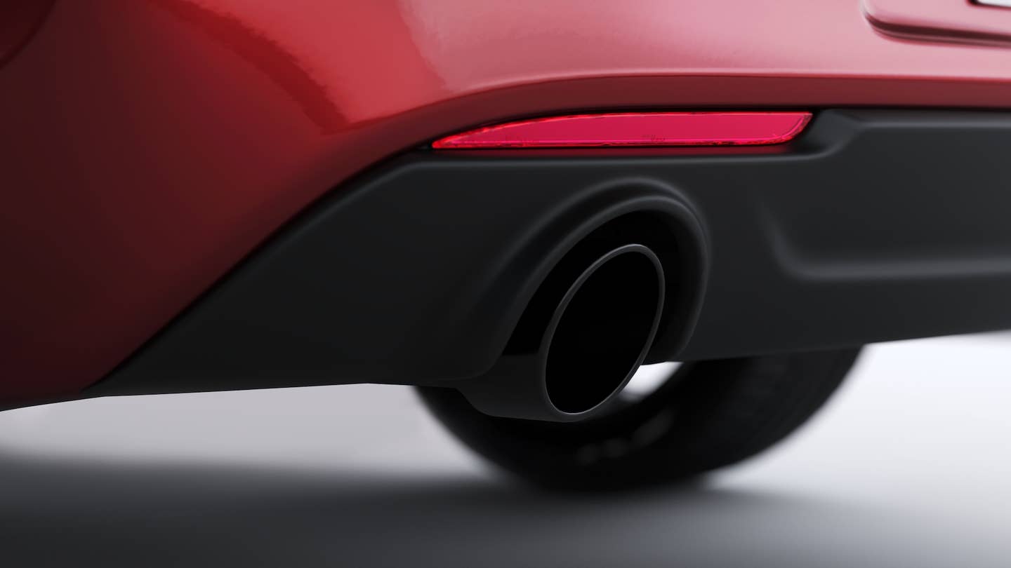 Black, rounded exhaust tips on the 2023 Chrysler 300C accent an active exhaust system that delivers a muscular, throaty sound.