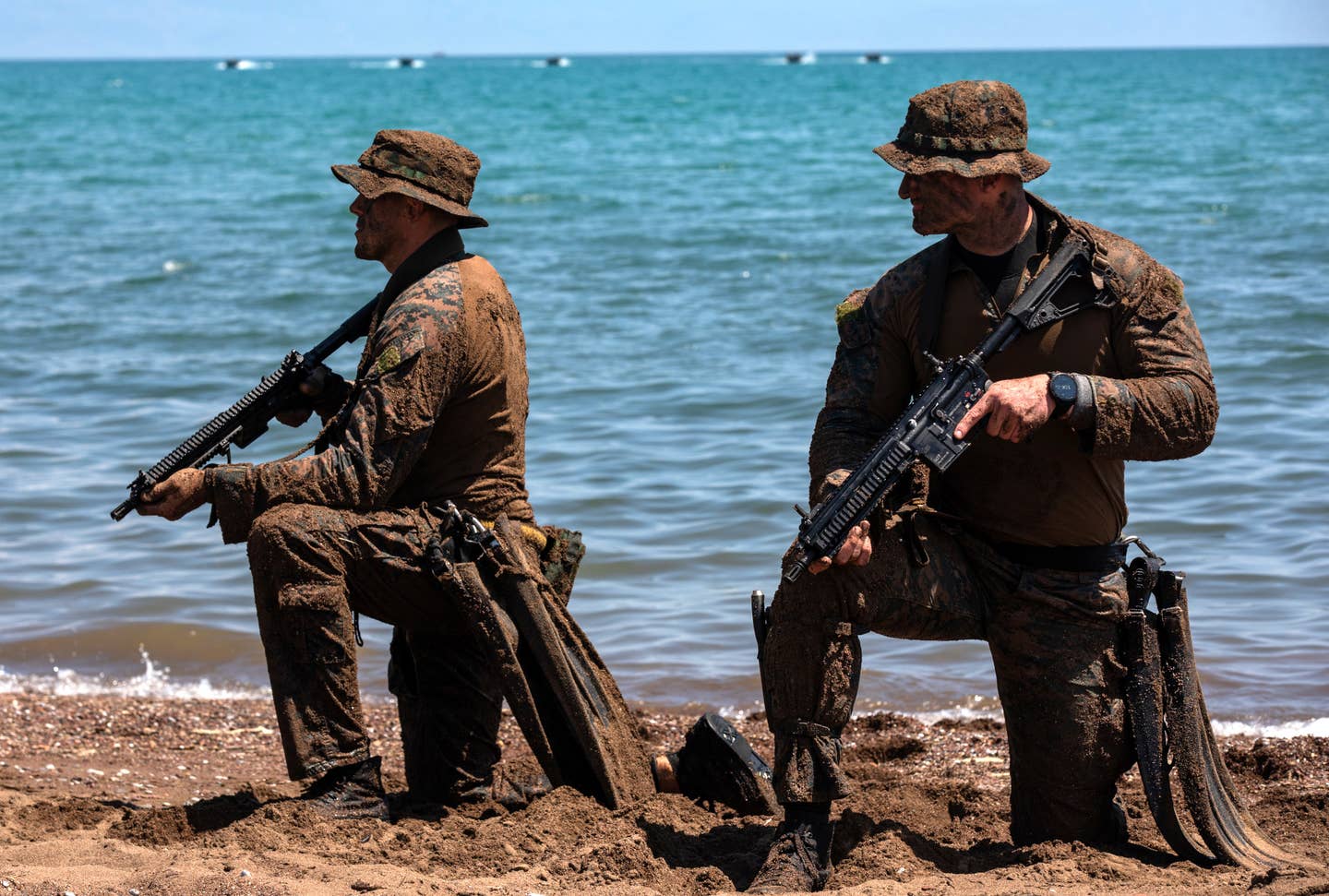 Two Marines carrying Reconnaissance Weapon Kit-equipped M27s during a training exercise in May 2022. <em>USMC / Cpl. Henry Rodriguez</em>