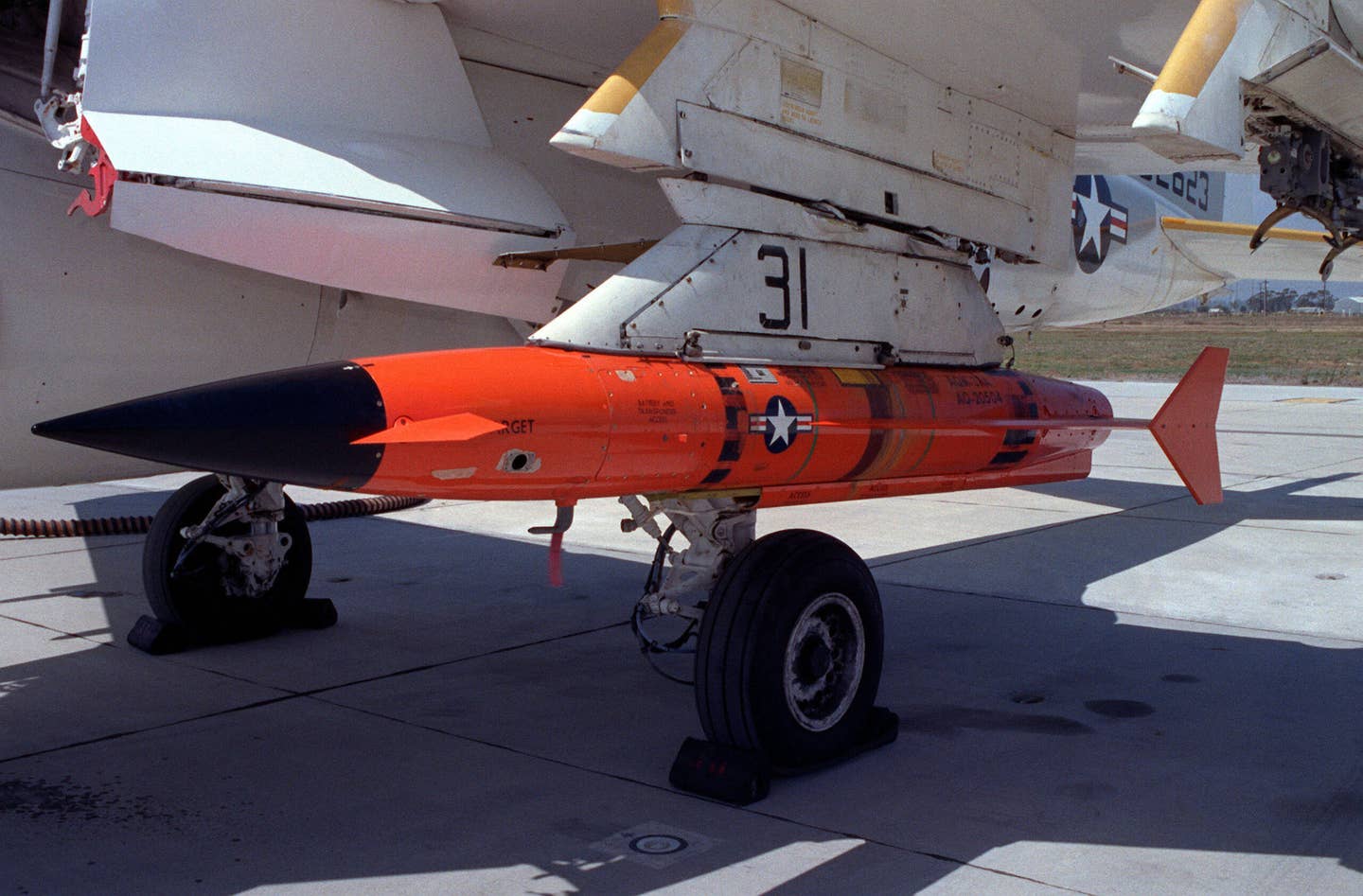 A view of an AQM-37A target after it is loaded onto the wing of an A-6E Intruder aircraft at the Pacific Missile Test Center. <em>Credit: U.S. Navy</em>