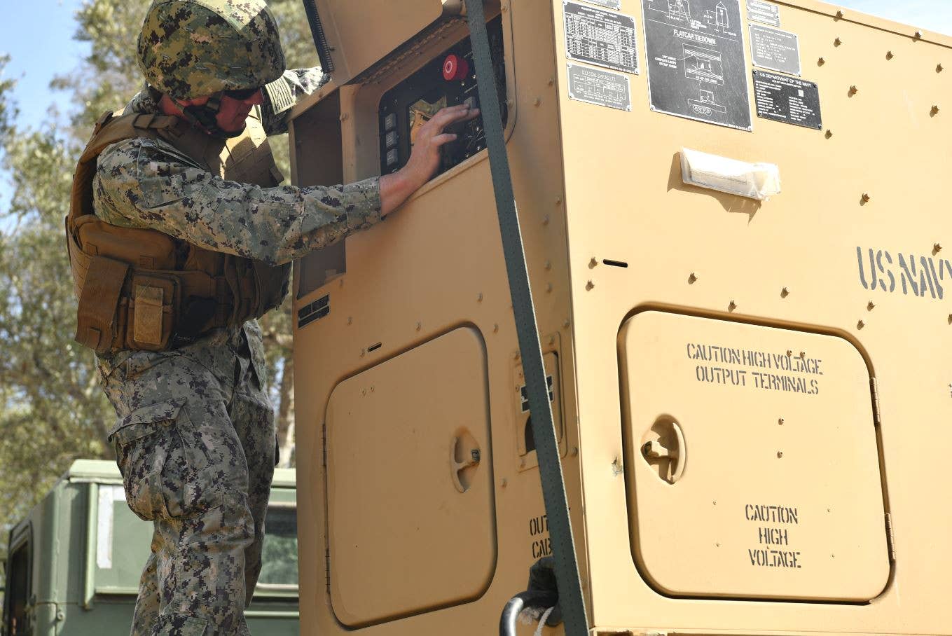 A sailor assigned to NAVFOREUR-AF/Sixth Fleet operators controls on the generator associated with the modular launcher system at the recent demonstration in Europe. <em>USN</em>