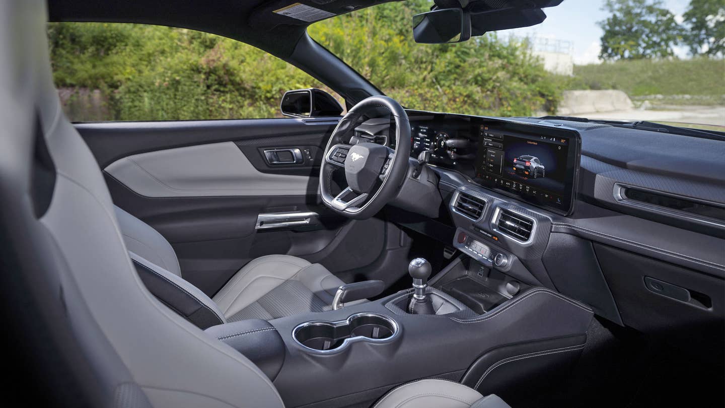 The new Mustang's interior definitely isn't the same as the old car, but it also shares a few parts. <em>Ford</em>