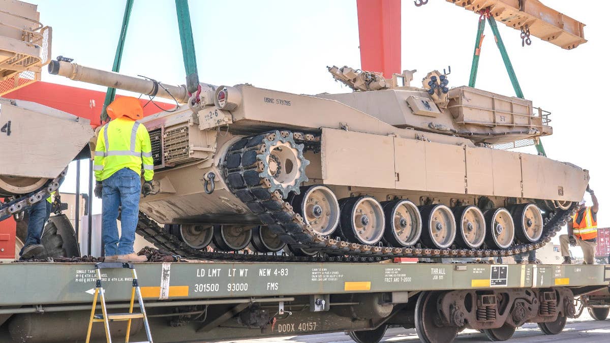 An ex-Marine M1 Abrams is loaded onto a railcar after its divestment in 2020. <em>USMC</em>