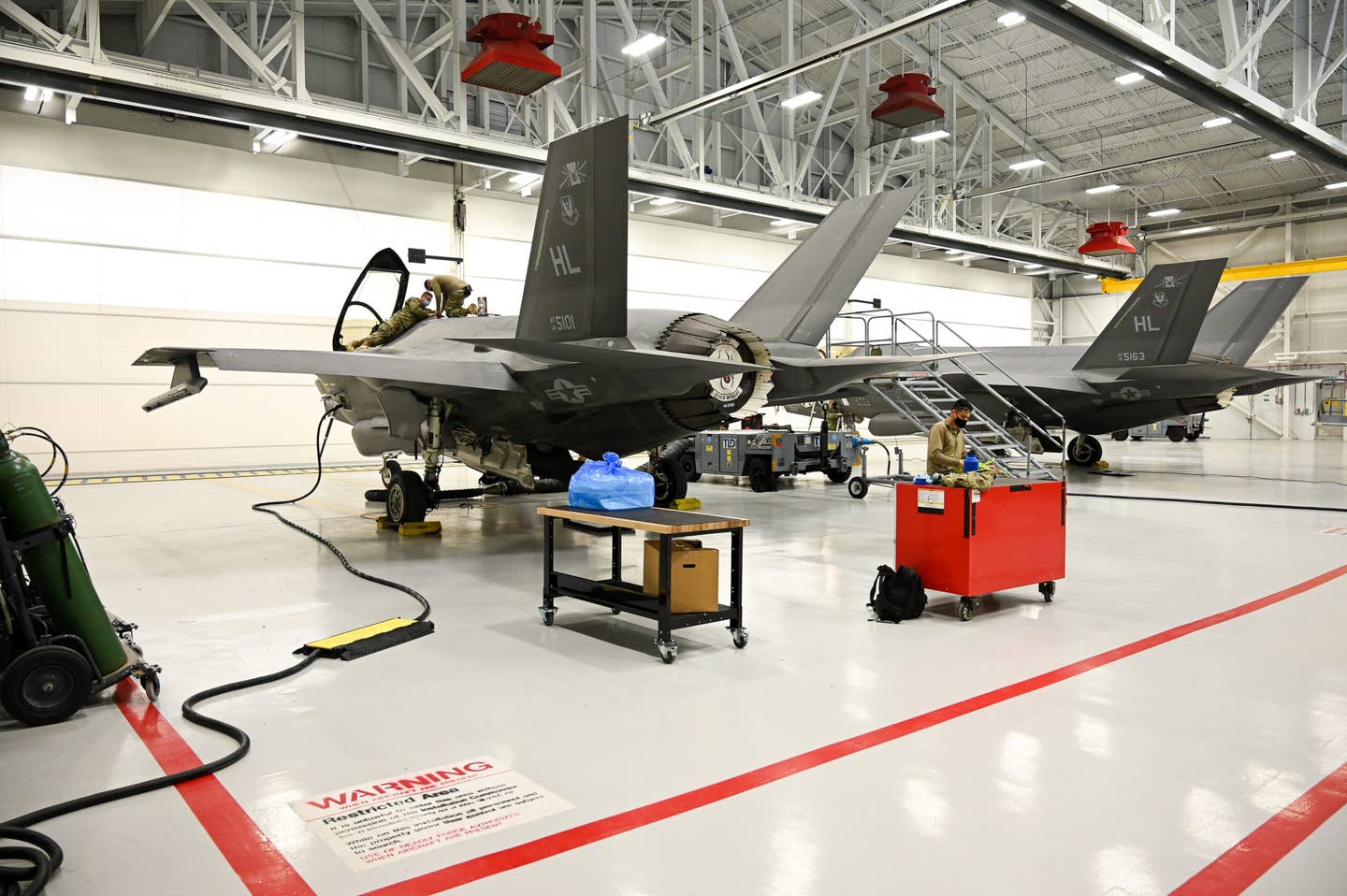 Maintainers with the 421st Fighter Generation Squadron perform maintenance on an F-35A at Hill Air Force Base, Utah. <em>U.S. Air Force photo by R. Nial Bradshaw</em>