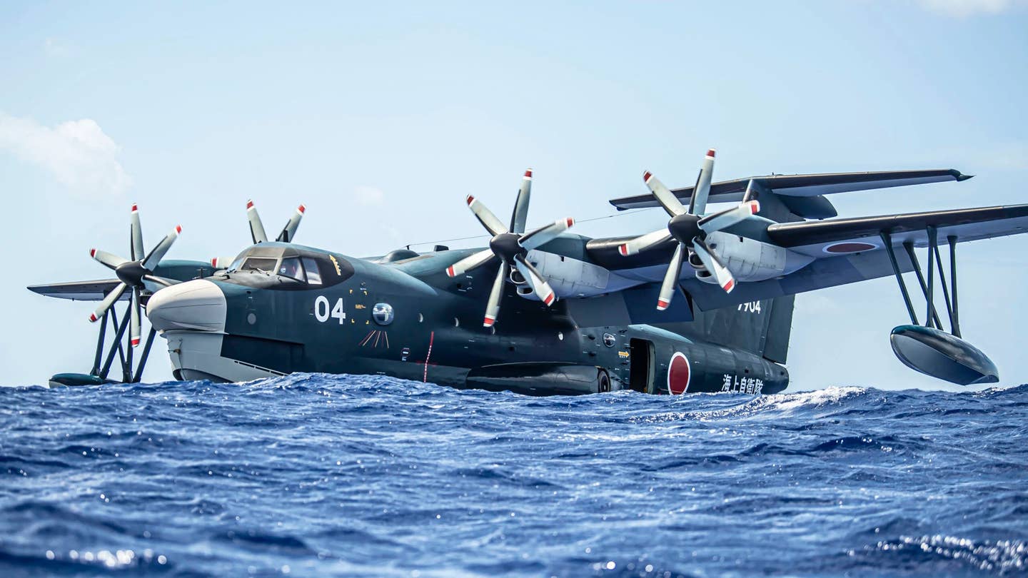 A Japanese ShinMaywa US-2 floats in the ocean during Exercise Cope North 22 off the Island of Tinian near Andersen Air Force Base, Guam, February 14, 2022.,&nbsp;<em>U.S. Air Force/Senior Airman Joseph P. LeVeille</em>
