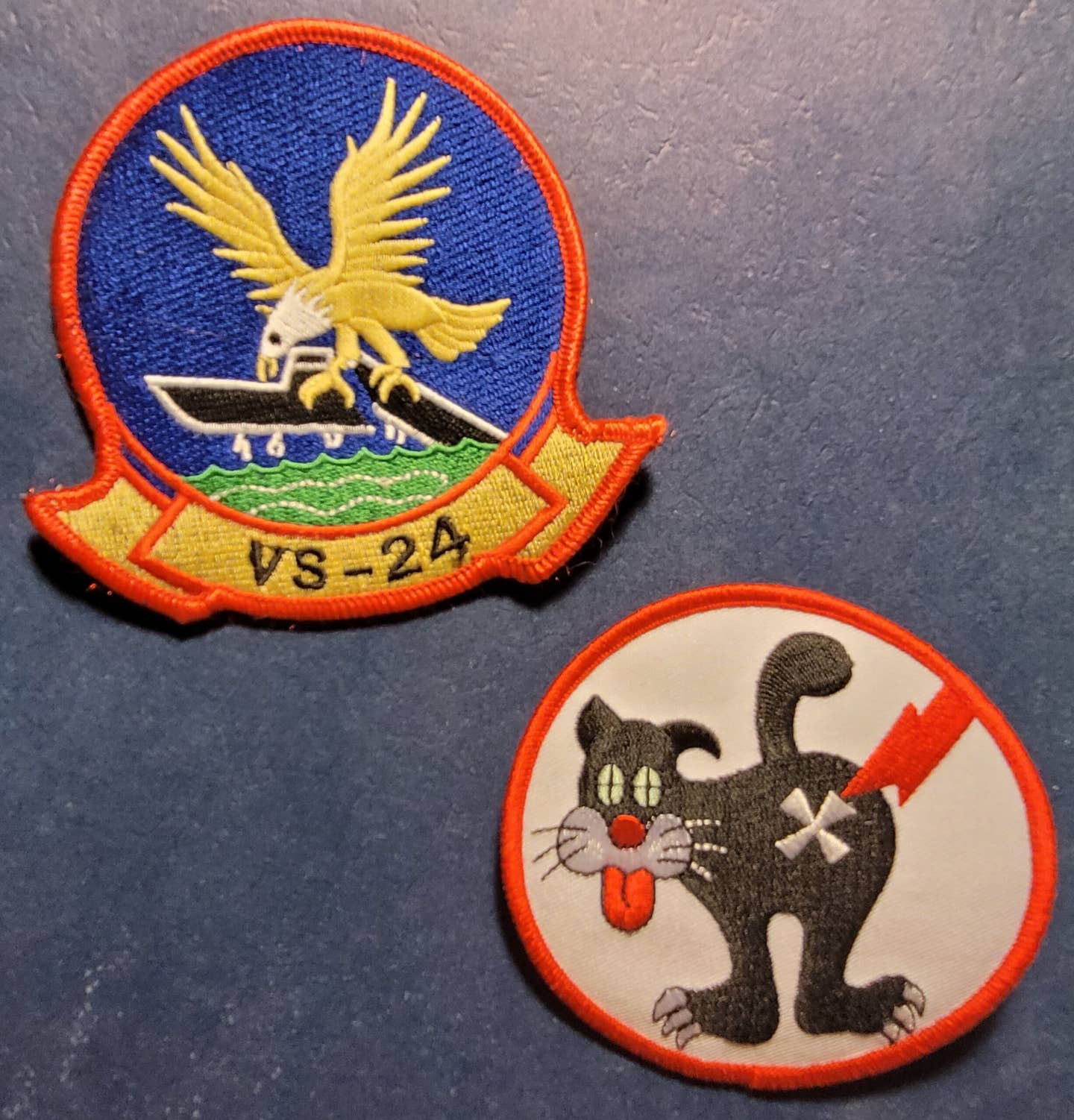 The VS-24 patch alongside the Duty Cat patch. <em>Author’s Collection</em>