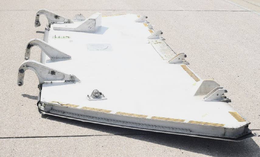 The left main landing gear door lying on the runway. <em>USAF</em>