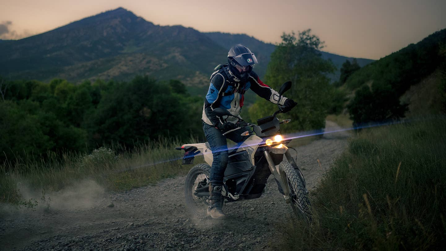 A person riding an electric motorcycle in the Utah mountains.