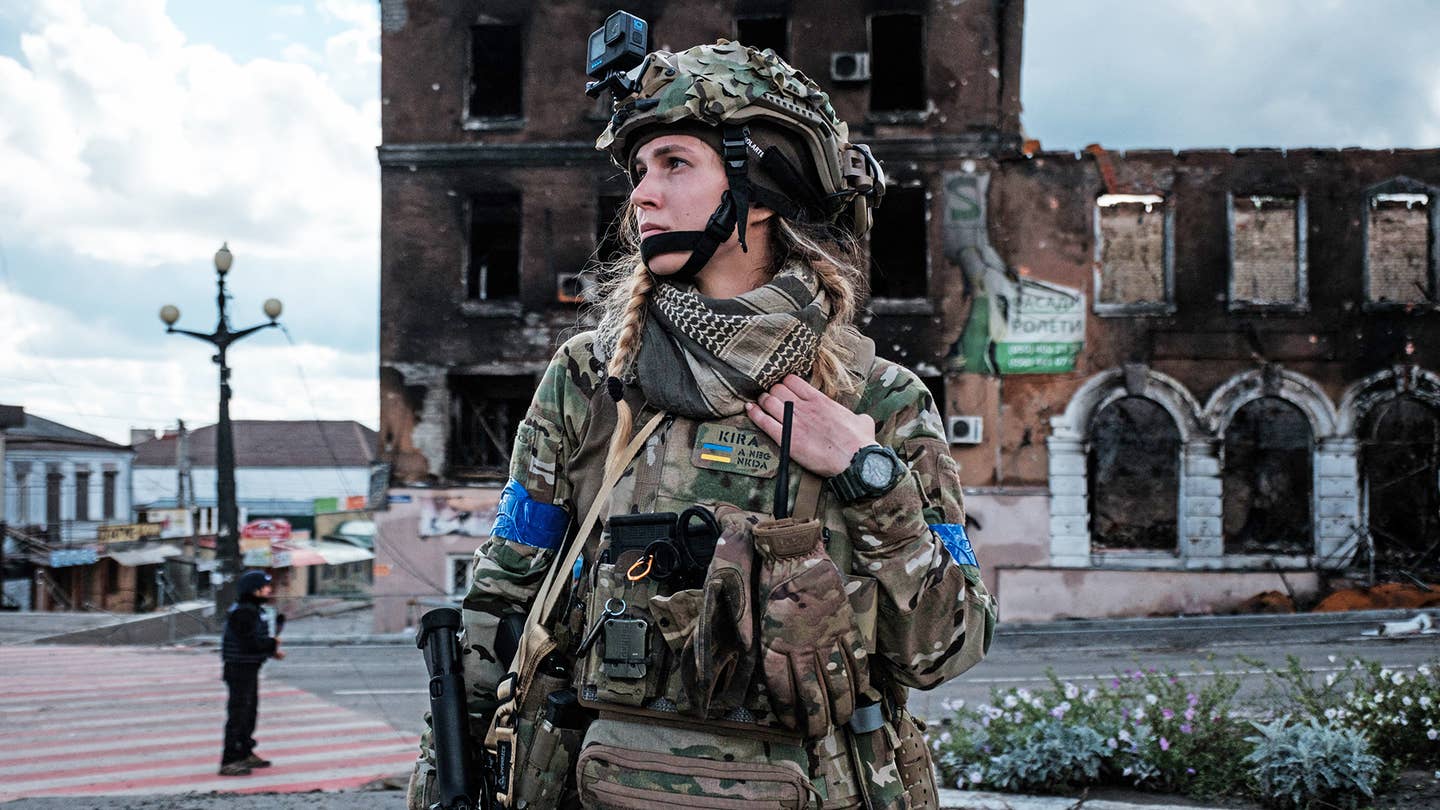 A Ukrainian soldier looks on during a patrol in the frontline city of Kupiansk, Kharkiv region, on September 24, 2022, amid the Russian invasion of Ukraine. - In the northeastern town of Kupiansk, which was recaptured by Ukrainian forces, clashes continued with the Russian army entrenched on the eastern side of the Oskil River. (Photo by Yasuyoshi CHIBA / AFP) (Photo by YASUYOSHI CHIBA/AFP via Getty Images)