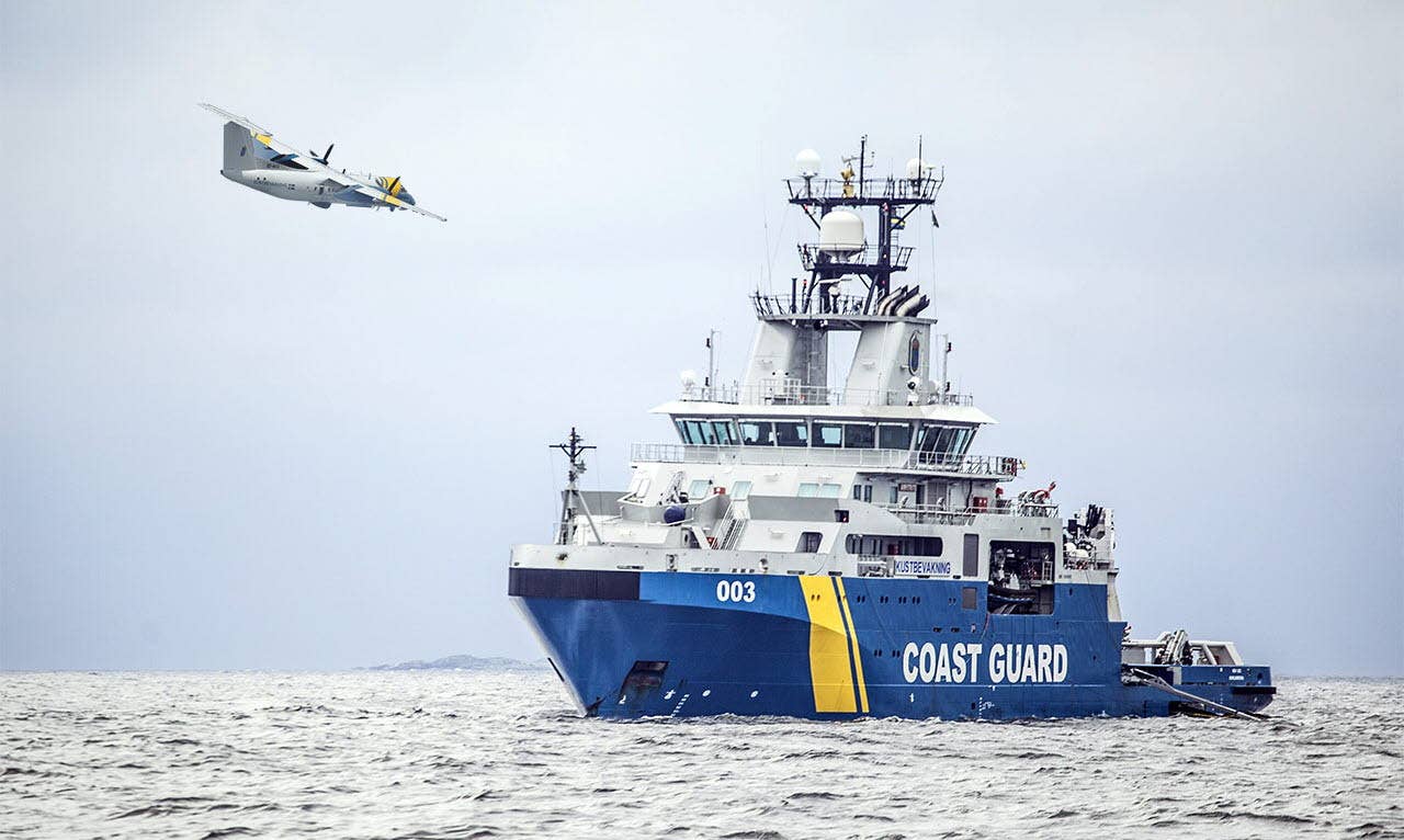 A stock picture of the Swedish Coast Guard search and rescue vessel <em>Amfitrite</em>, with one the service's Dash 8-Q300 aircraft flying overhead. <em>Swedish Coast Guard</em>