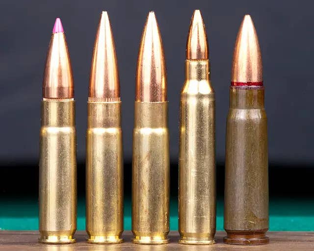 From left to right, three different .300 Blackout cartridges, a 5.56x45mm cartridge, and a 7.62x39mm cartridge. <em>Silencertalk via Wikimedia Commons</em>
