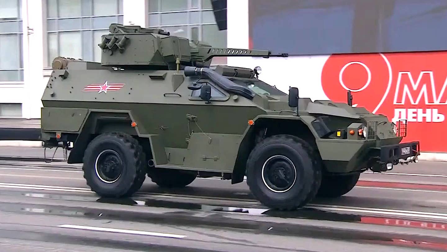 A BPM-97 equipped with a BM-30D turret seen during a parade in 2021. <em>capture via VK</em>