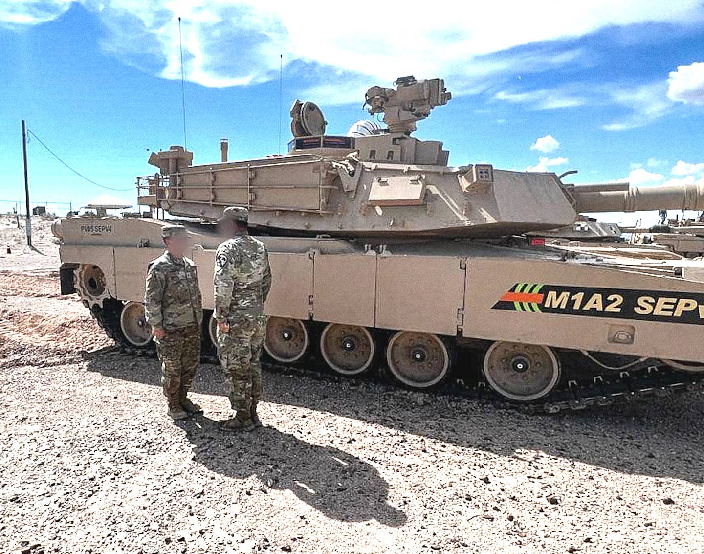 The M1A2 SEPv4's new meteorological sensor is the small mast seen on top of the rear end of the turret in this picture. A boxy protrusion seen toward the front of the turret may be a component of the LWR system. <em>US Army</em>