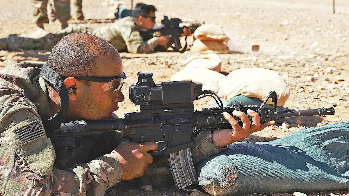 U.S. personnel assigned to Special Operations Joint Task Force-Operation Inherent Resolve (SOJTF-OIR) train with M4A1 carbines equipped with SMASH 2000 sighting systems in Syria in 2020. <em>Credit:&nbsp;U.S. Army</em>
