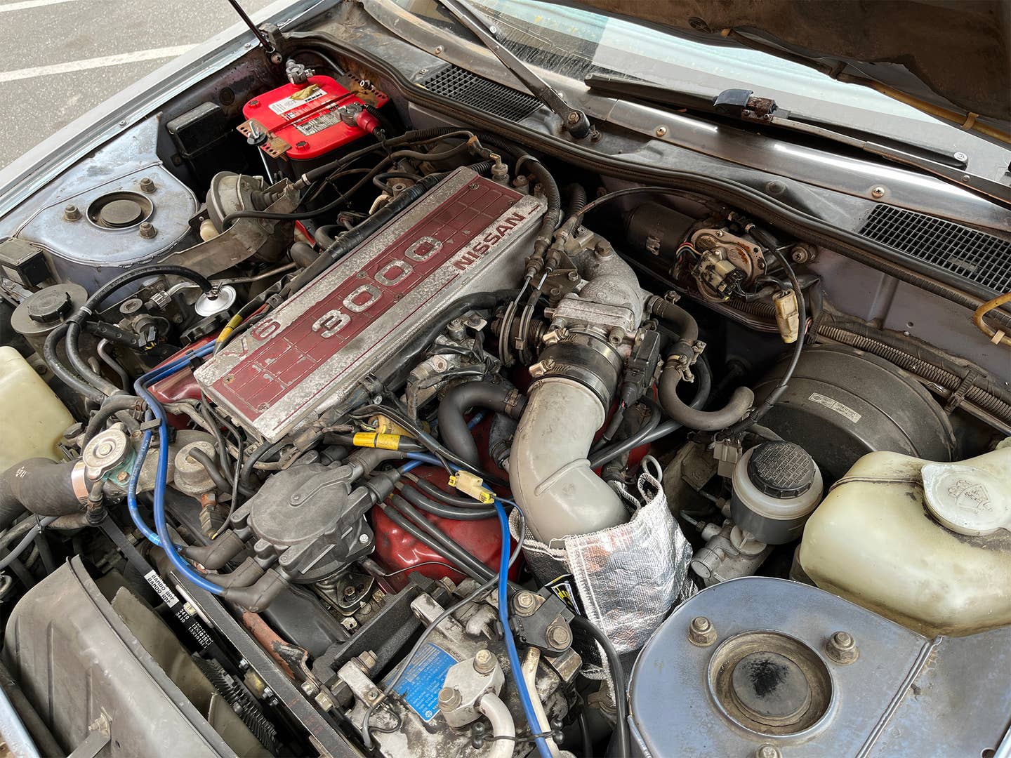 There's my new intake hose all cozy in its heat blanket. The VG is a cool-looking engine, isn't it? <em>Andrew P. Collins</em>