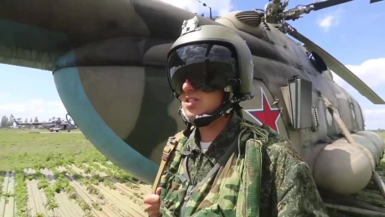 In a video published by the Russian Ministry of Defense, a soldier (seemingly a pilot) standing next to a Mi-8MTPR-1 explains that the Rychag system suppresses Ukrainian radars in order to allow friendly strike aircraft to penetrate deeper into Ukraine. <em>Russian Ministry of Defense</em>
