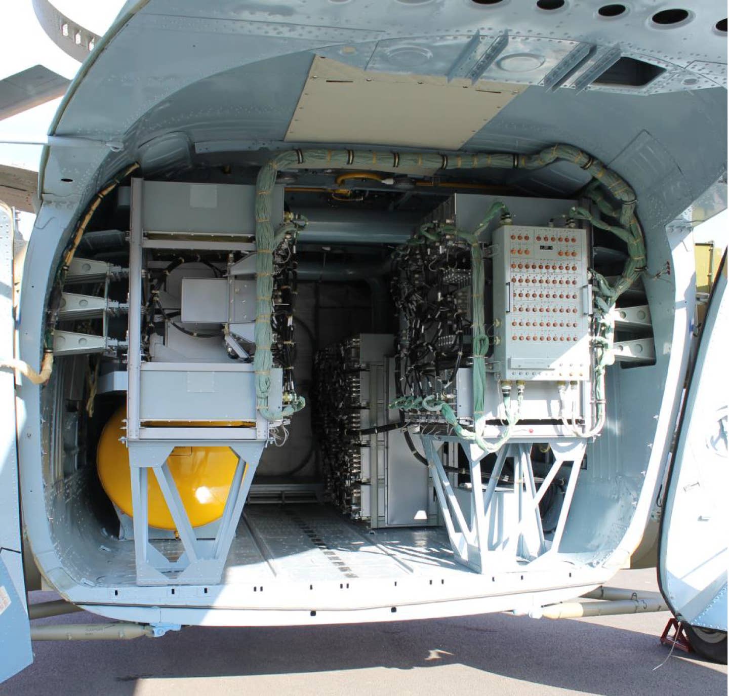 The equipment boxes take up the entire space within the hold of the Mi-8MTPR-1 helicopter. <em>KNIRTI</em>