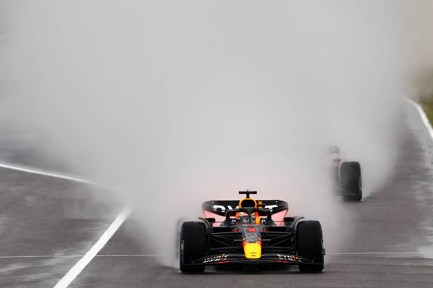 The visibility at Suzuka was nonexistent—that's Leclerc behind Verstappen | Photo by Mark Thompson/Getty Images
