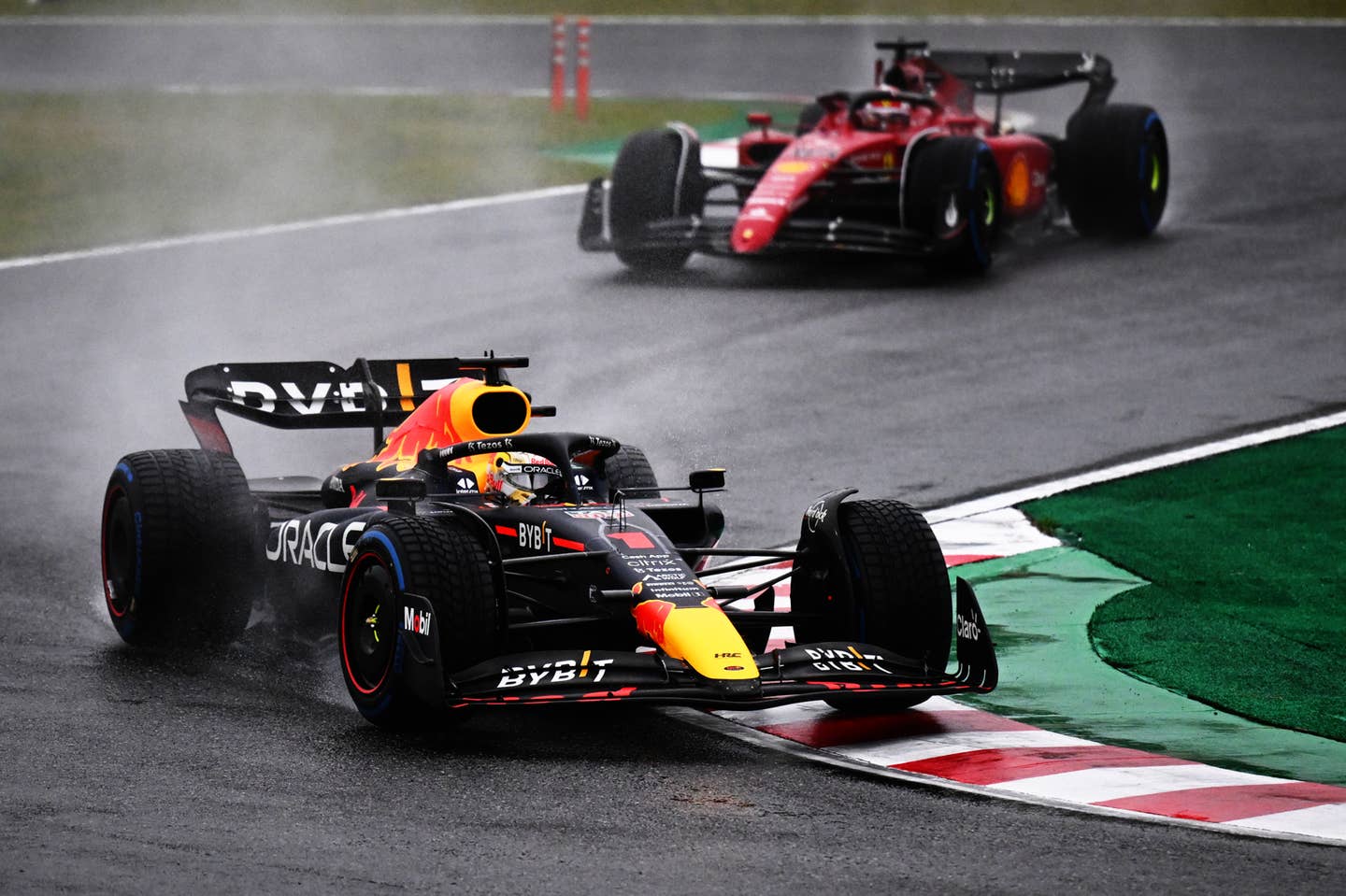 Max Verstappen leading Charles Leclerc | Photo by Clive Mason/Getty Images
