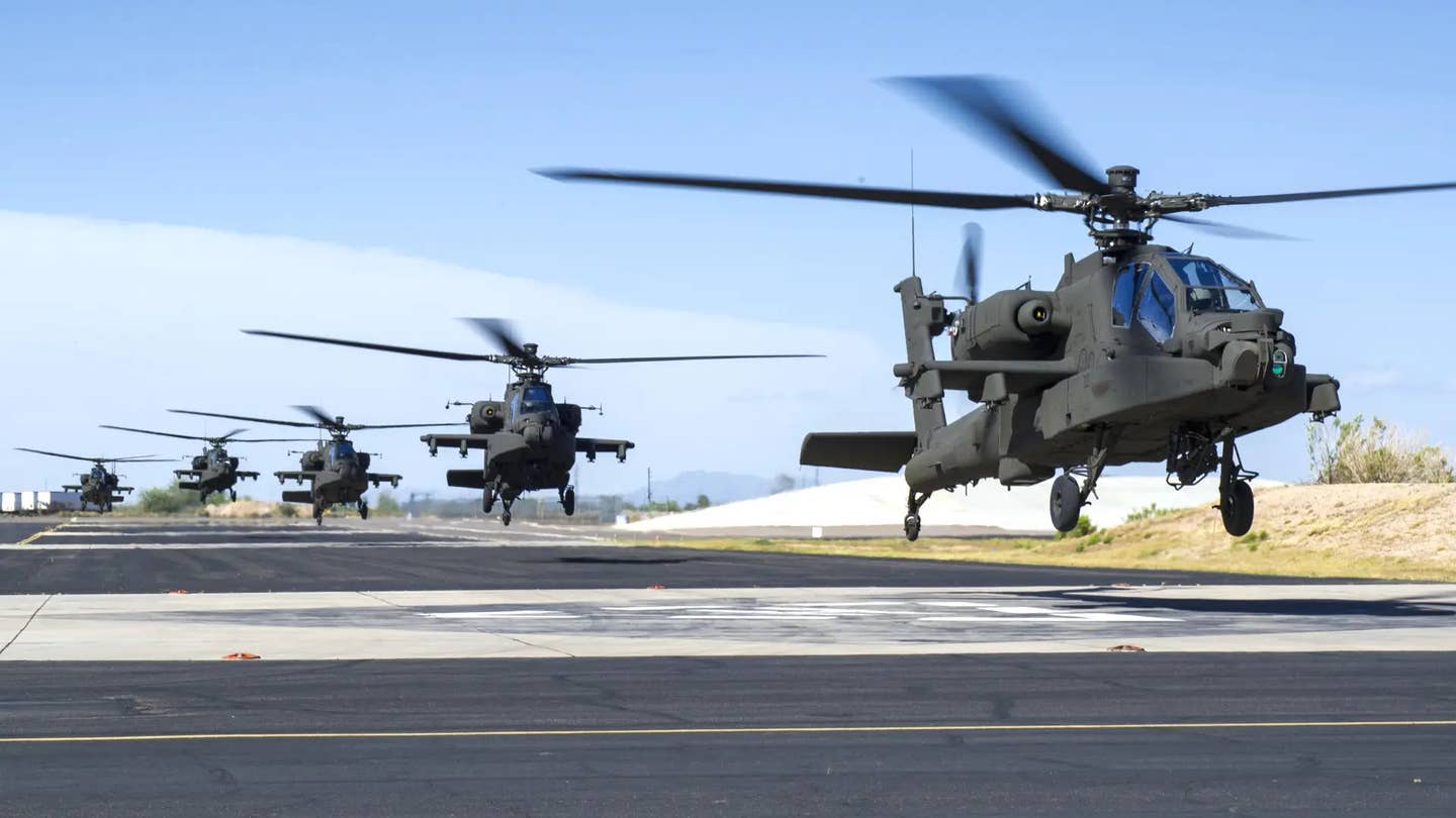US Army AH-64 Apache attack helicopters. <em>US Army</em>
