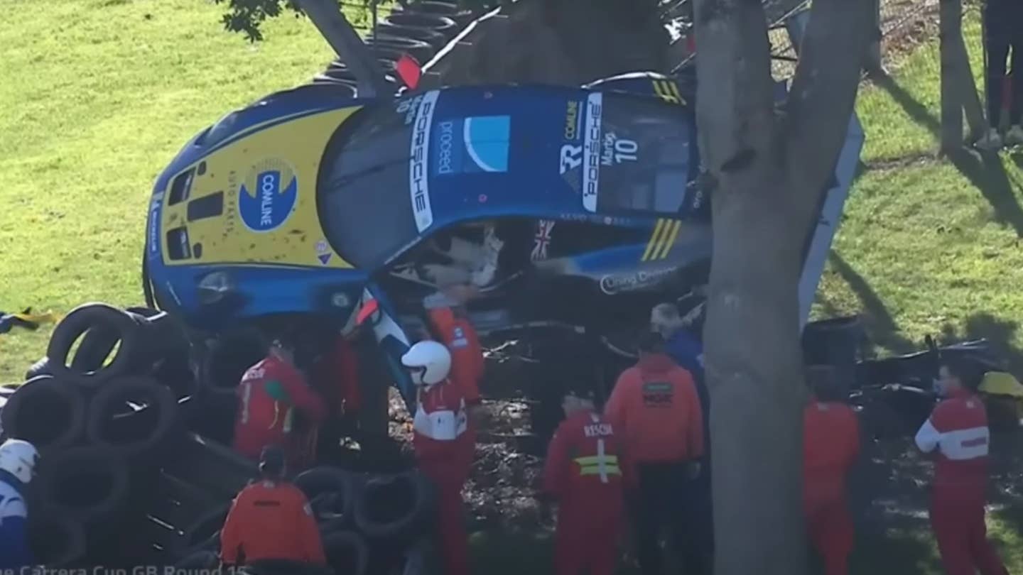 Porsche Race Car Gets Stuck in a Tree After Crash Sends It Flying Through the Air