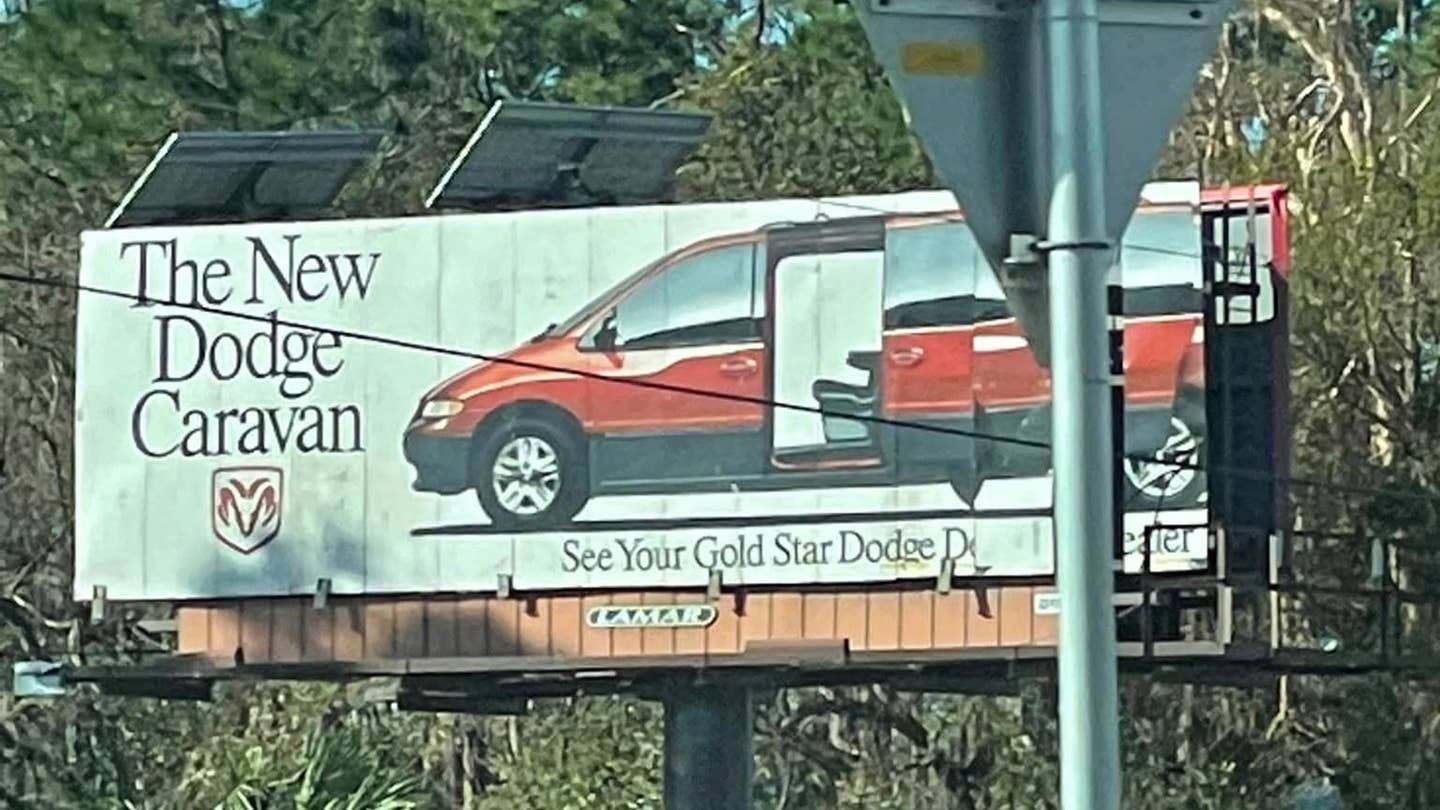 Perfectly Preserved 1996 Dodge Caravan Billboard Revealed by Hurricane Ian in Florida