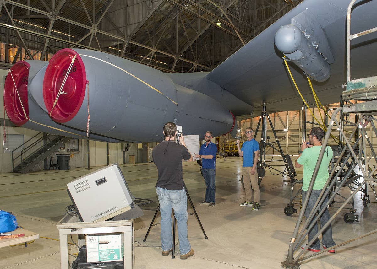 A LITENING targeting pod under the wing of a B-52H. <em>USAF</em>