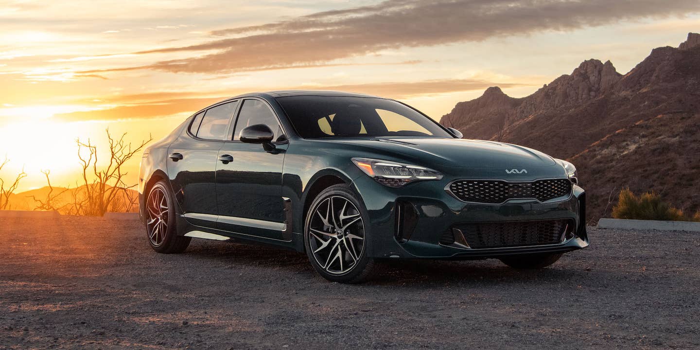 2022 Kia Stinger GT-Line in front of a sunset