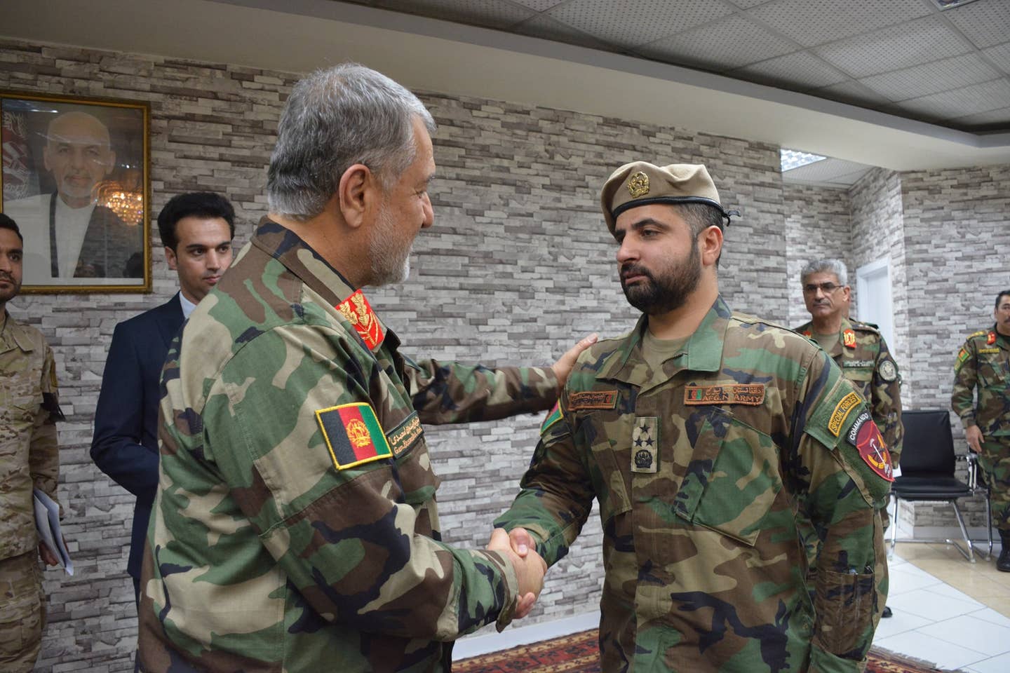 Afghan Defense Minister, Gen. Bismillah Khan Mohammadi, promotes Haibatullah Alizai to lieutenant general on Aug. 11, 2021. (Haibatullah Alizai photo)