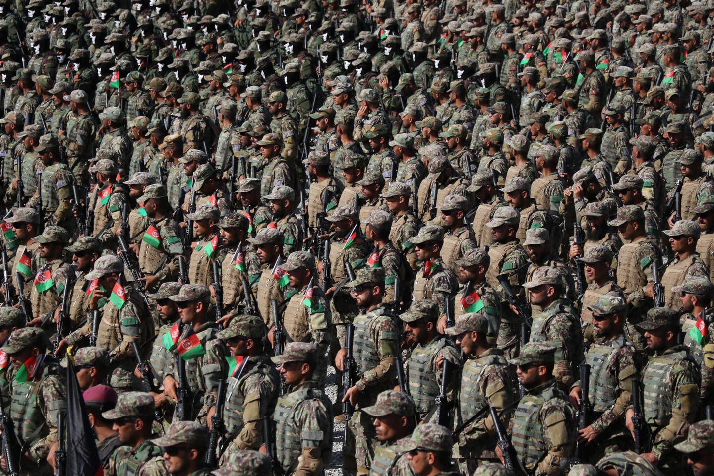Afghan special force commando unit officers and soldiers attend a graduation ceremony at the military academy in Kabul, Afghanistan, on May 31, 2021. (Photo by Haroon Sabawoon/Anadolu Agency via Getty Images)
