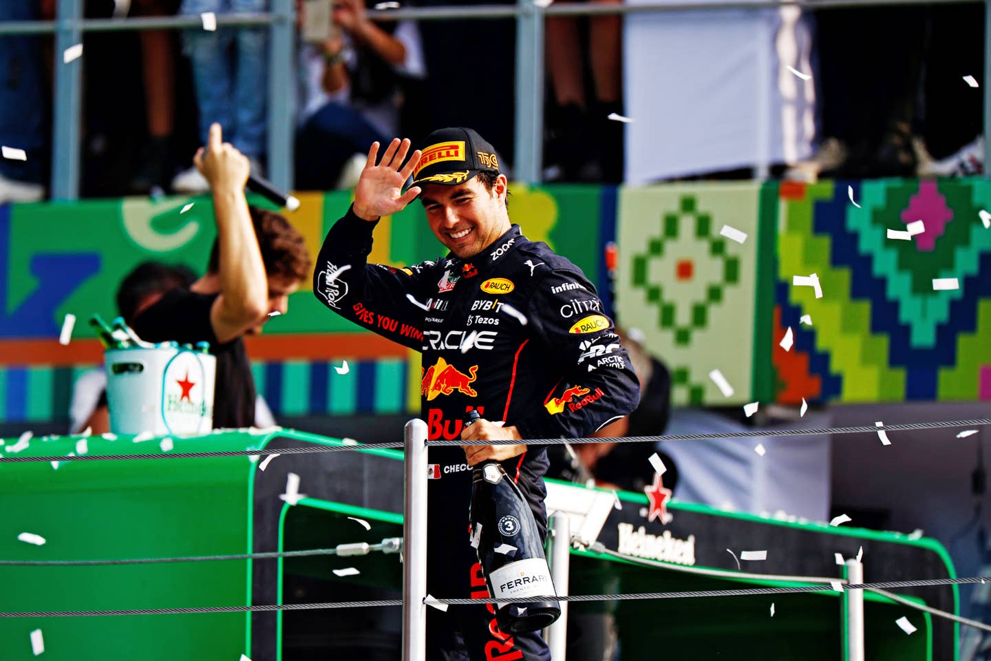 Sergio Perez celebrates a podium finish in Mexico | Photo by Clive Mason - Formula 1/Formula 1 via Getty Images