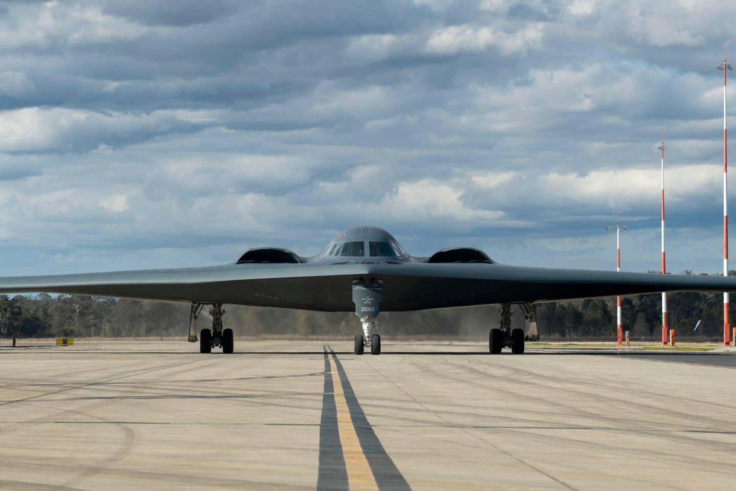 A U.S. Air Force B-2 Spirit, assigned to the 509th Bomb Wing, Whiteman Air Force Base, Missouri, arrives in support of a Bomber Task Force training exercise at RAAF Amberley, Australia, July 10, 2022. <em>U.S. Air Force photo by Tech. Sgt. Dylan Nuckolls</em>
