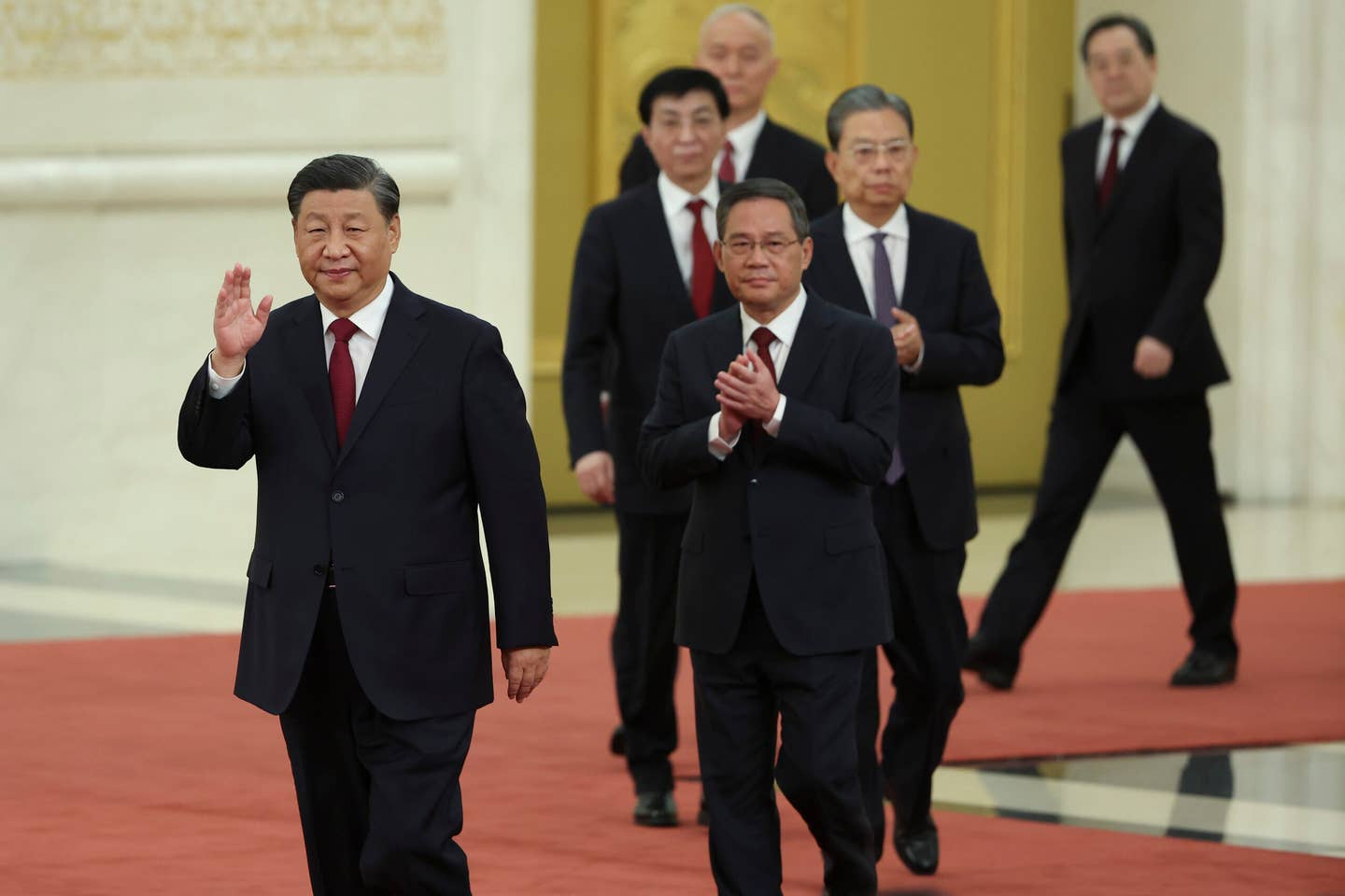 Xi Jinping (left), attends a meeting during the Communist Party Congress on October 23, 2022, in Beijing. <em>Photo by Lintao Zhang/Getty Images</em>