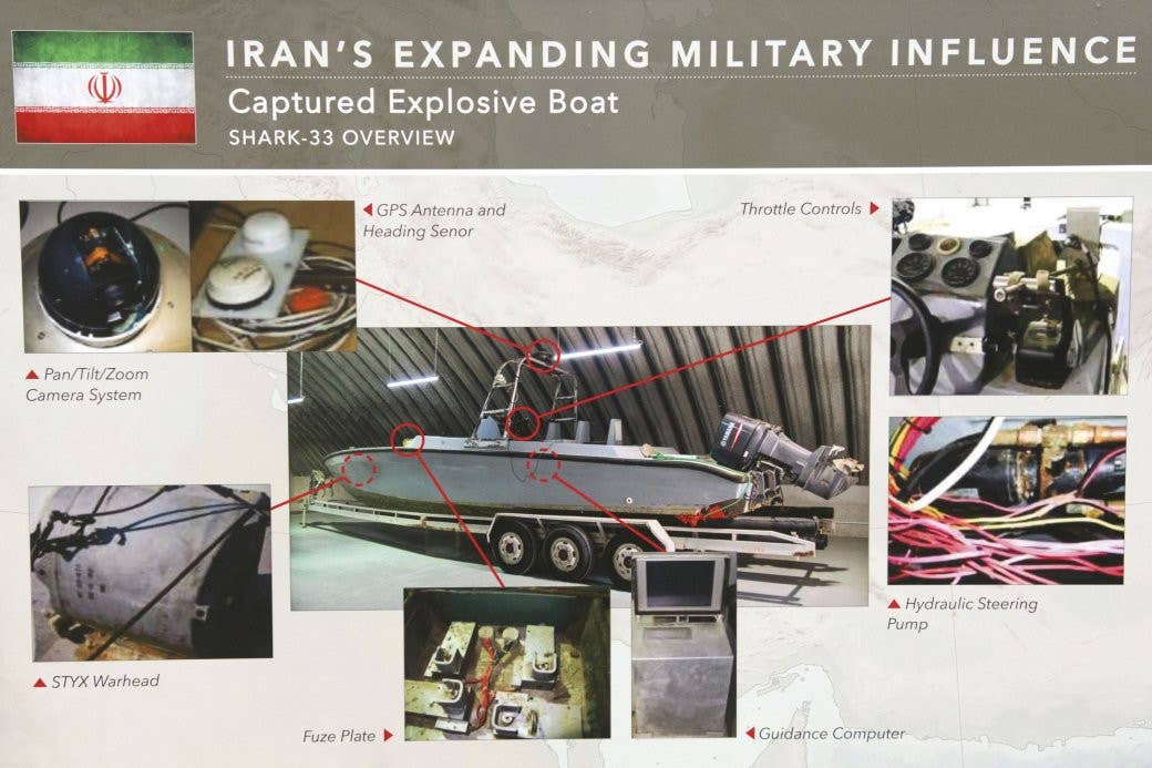 A U.S. Department of Defense briefing slide from 2017 highlighting Iranian-supplied components of a captured Houthi suicide drone boat, referred to as the Shark-33, including a guidance system with GPS-assisted navigation and optical sensor capabilities. American authorities said at the time that it was capable of tracking and engaging moving targets, as well as stationary ones. <em>DOD</em>
