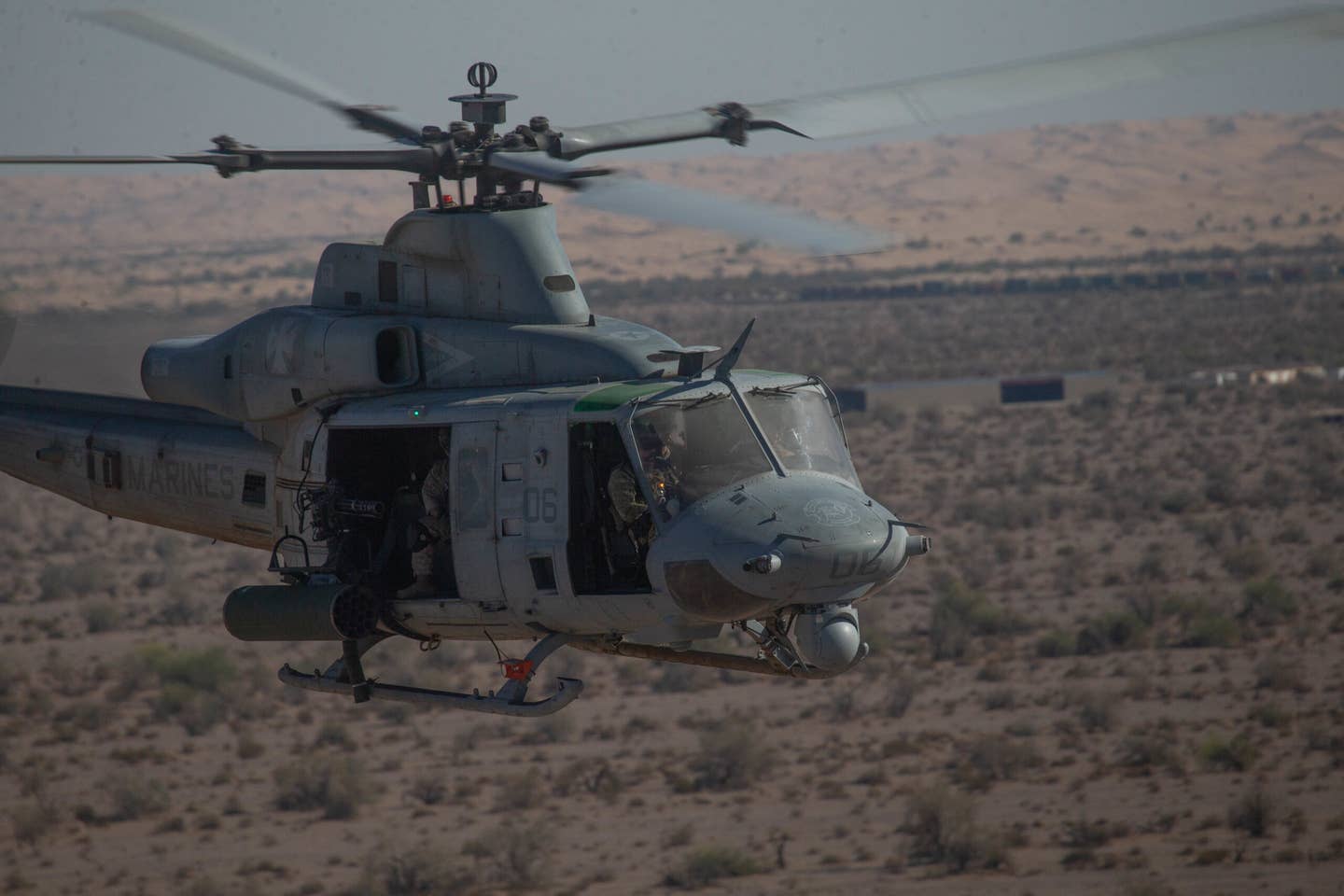 A U.S. Marine Corps UH-1Y Venom conducts day gun exercises near Yuma, Arizona in April. <em>U.S. Marine Corps photo by Lance Cpl. Emily Weiss</em>