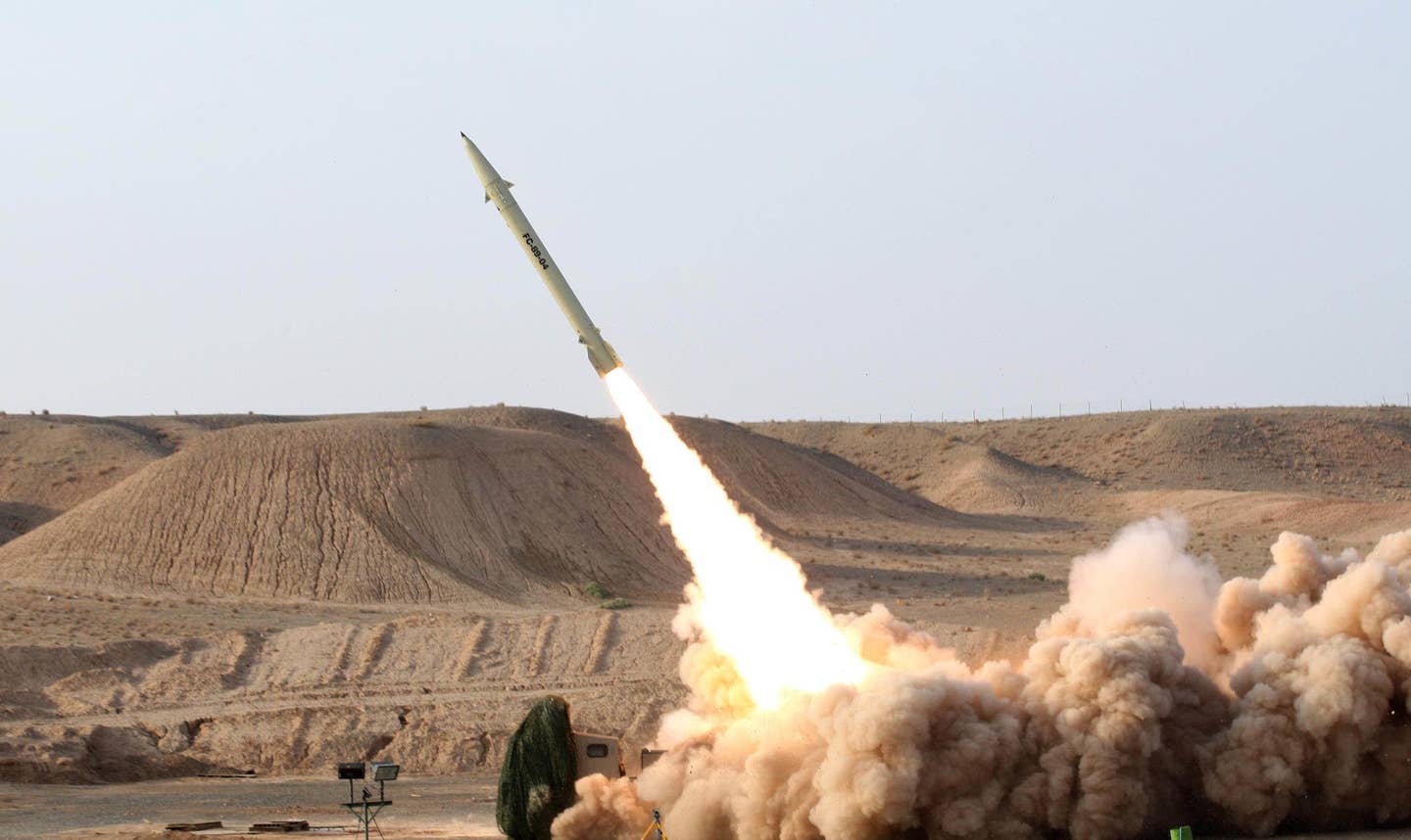 Iran test-fires its surface-to-surface Fateh 110 missile like those that will supposedly be sent to Russia. (Photo by Mohsen Shandiz/Corbis via Getty Images)