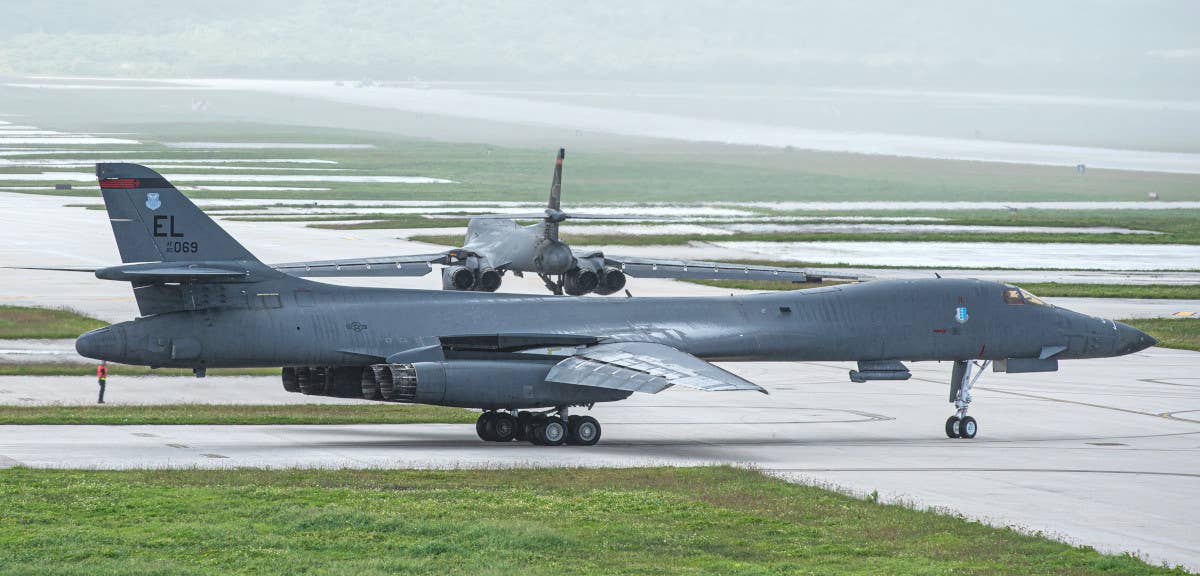 B-1B bombers from the 28th Bomb Wing at Ellsworth Air Force Base in South Dakota, seen here on Guam on October 29 as part of an ongoing Bomber Task Force deployment. <em>USAF</em>