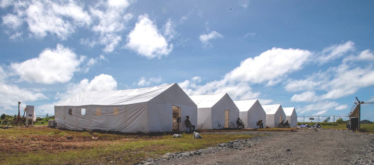 Tents erected at Roman Tmetuchl International Airport to support the Iron Thunder deployment. <em>USAF</em>