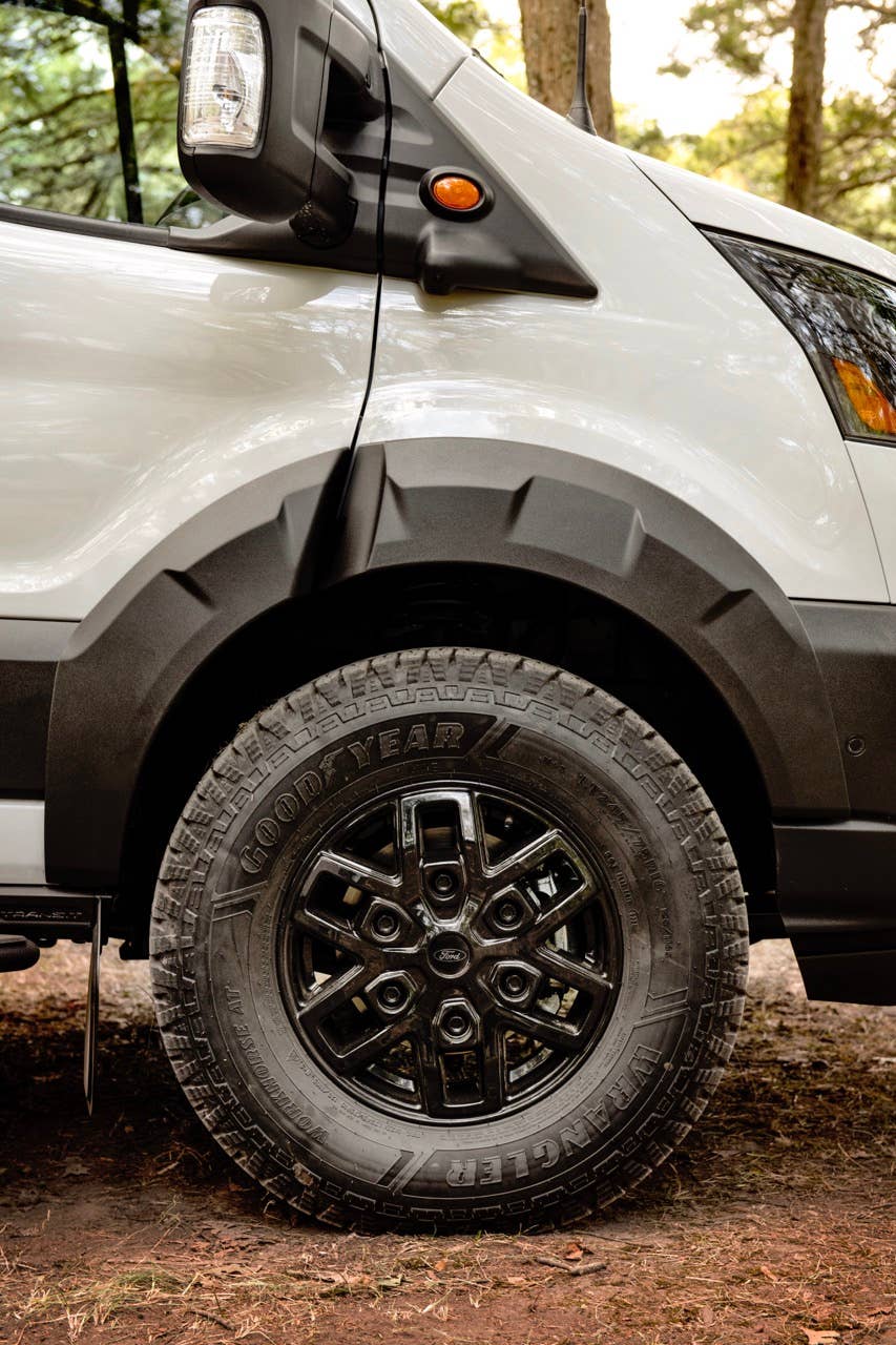 The 2023 Transit Trail van comes standard with 30.5-inch Goodyear Wrangler Workhorse all-terrain tires and 16-inch black alloy wheels. (2023 Ford Transit Trail available Fall 2022. Preproduction model shown.)