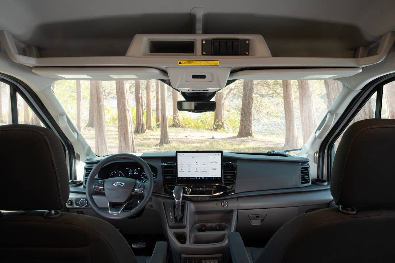 2023 Transit Trail Cab and Cab Shelf. (2023 Ford Transit Trail available Fall 2022. Preproduction model shown with aftermarket equipment.)