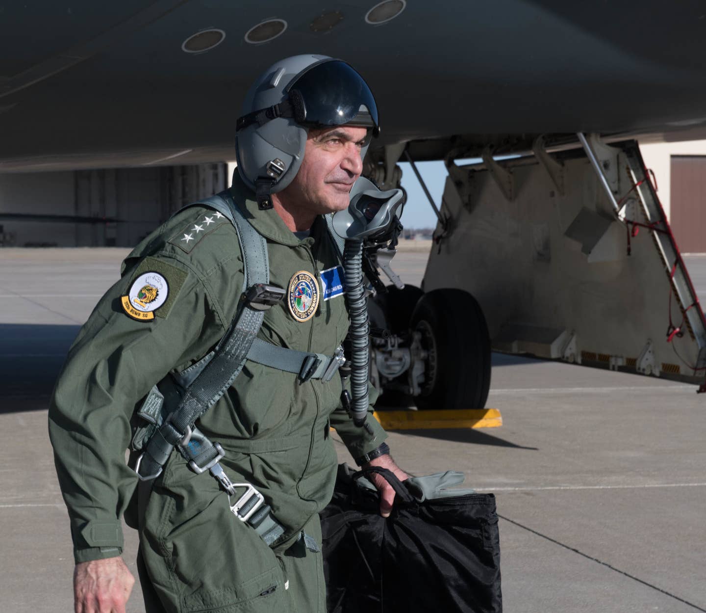 U.S. Navy Adm. Charles Richard, commander of U.S. Strategic Command, walks away from a B-2 Spirit Stealth Bomber after a familiarization flight at Whiteman Air Force Base, Missouri, March 5, 2020. (U.S. Air Force Photo by Airman 1st Class Thomas Johns)