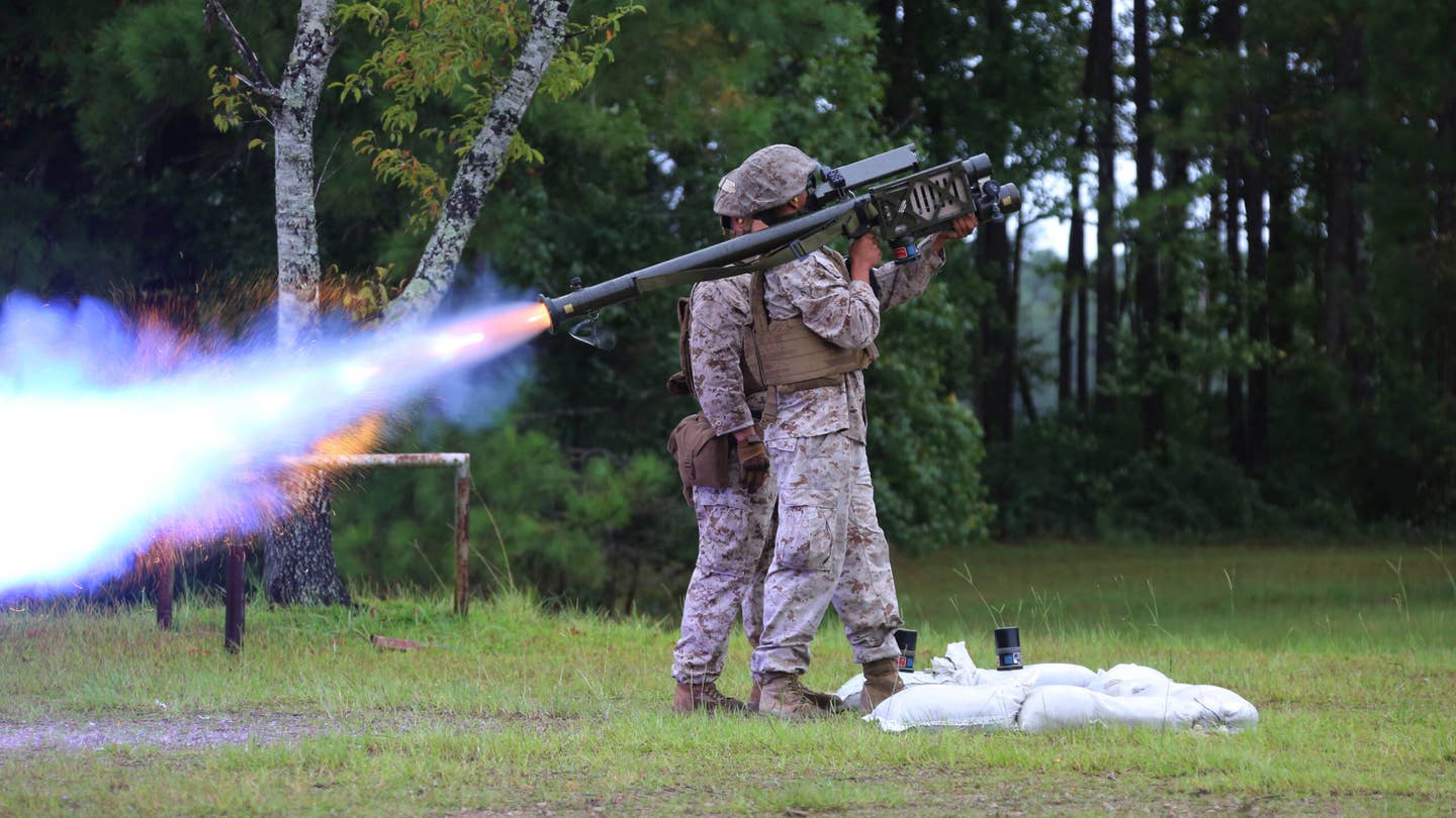 A Marine from the 2nd Low Altitude Air Defense Battalion fires an FIM-92 Stinger missile at a target during training at Marine Corps Air Station Cherry Point, North Carolina. <em>U.S. Marine Corps</em>