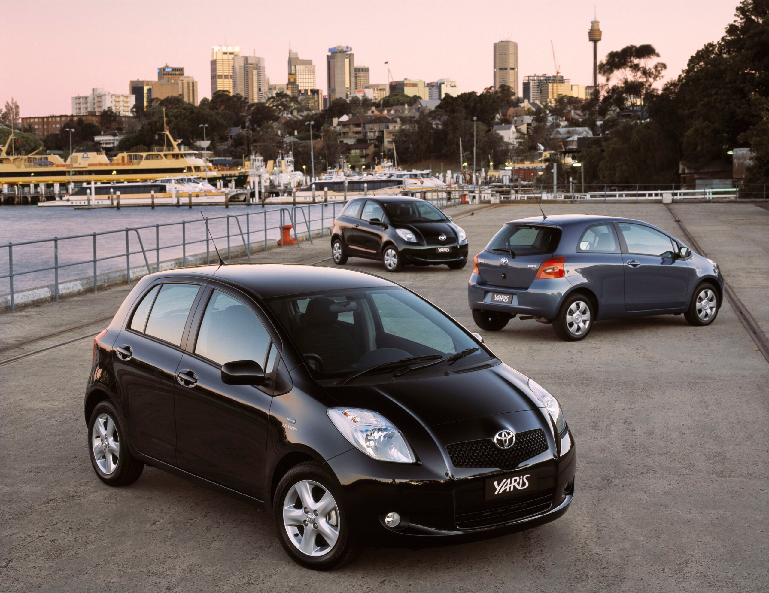2005 Toyota Yaris YRX (left, foreground), YRS (right, midground) and YR (centre, background).