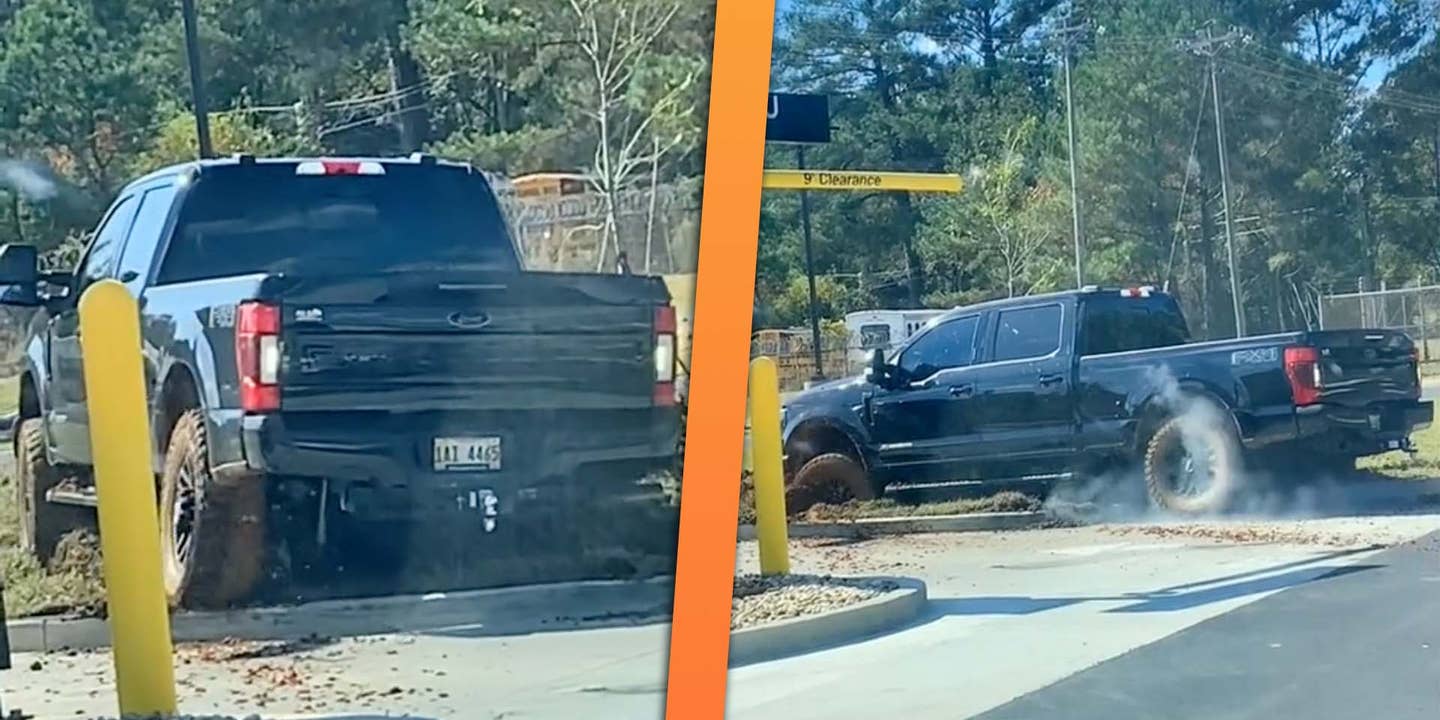 Watch a Ford Super Duty Driver Bury Their Truck Trying to Cut Drive-Thru Line