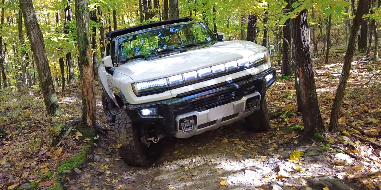 Watch a GMC Hummer EV Go Head to Head With a Classic H1 on Tight Trails